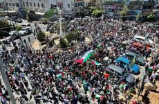 مسيرة على دوار المنارة تضامناً مع غزة.jpeg