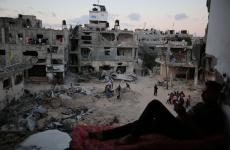 من فوق ركام منازل المواطنين شمال القطاع