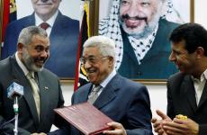 دحلان هنية عباس.jpg