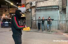 جنين تحتفل بعملية تل أبيب