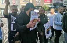 وقفة تضامنية مع الأسير خليل عواودة في الخليل.jpg