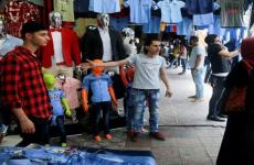 العيدية تنعش أسواق قطاع غزة.jpg