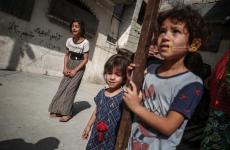 أطفال يبكون بغزة