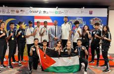 فلسطين تحصد 13 ميدالية ببطولتيّ العالم والأندية للعبة المواي تاي.jpg