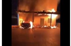 مستوطنون يحرقون منازلا ومركبة شمال رام الله.JPG
