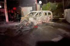 صور مستوطنون يحرقون مركبات في نابلس.jpg