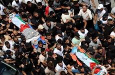 جماهير نابلس تشيع الشهداء.jpg