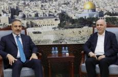 درويش مع وزير الخارجية التركي.jpg