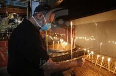 مسيحيو فلسطين يشعلون الشموع.JPG