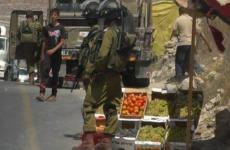 اتلاف خضار الاحتلال.jpg