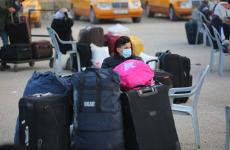 بدء مغادرة حافلات المسافرين عبر معبر رفح ‫(154912986)‬ ‫‬.jpg