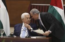 اشتية وعباس.jpeg