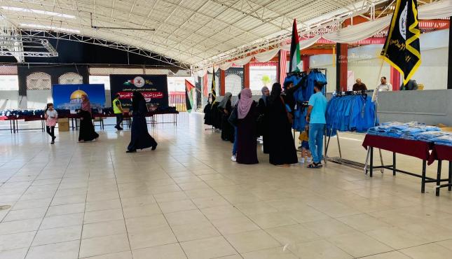 حركة الجهاد الإسلامي غزة تطلق حملة مع الناس لتوزيع كسوة المدارس  1.jfif