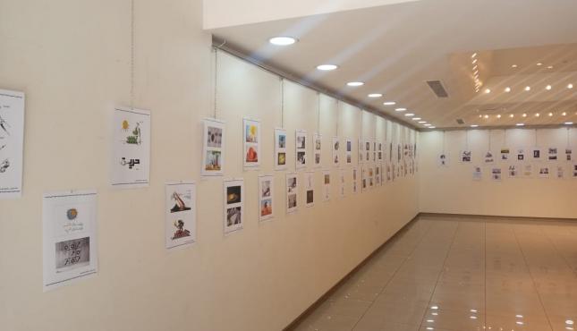 مهجة القدس تنظم معرض كاريكاتير في ذكرى انتزاع الحرية.jfif