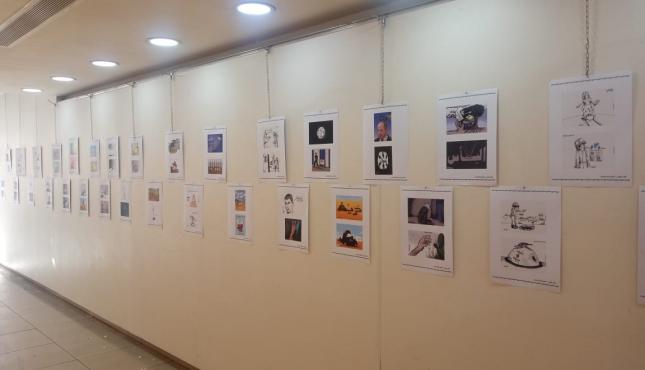 مهجة القدس تنظم معرض كاريكاتير في ذكرى انتزاع الحرية 8.jfif