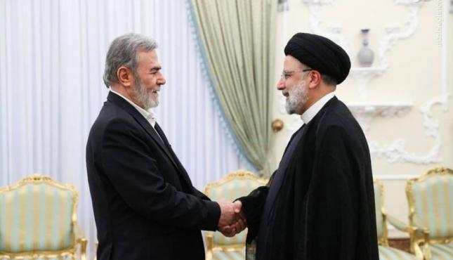 القائد النخالة والرئيس الإيراني رئيسي.jpg