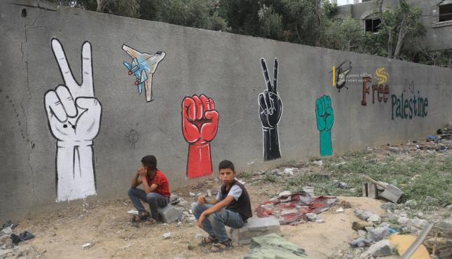 جداريات الاحتلال يقتل الطفولة (9).jpeg