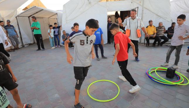 الهلال الأحمر الفلسطيني يُشارك في إجلاء 110 مريضًا من غزة إلى الإمارات للعلاج