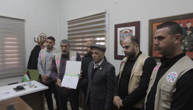 بالصور توقيع اتفاقية لإنشاء مخيم إيواء موظفي بلدية غزة