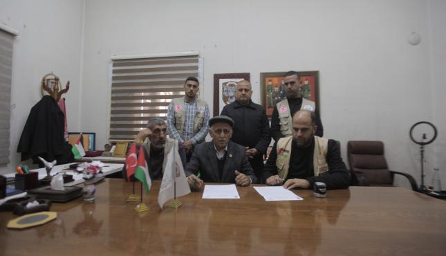 بالصور توقيع اتفاقية لإنشاء مخيم إيواء موظفي بلدية غزة