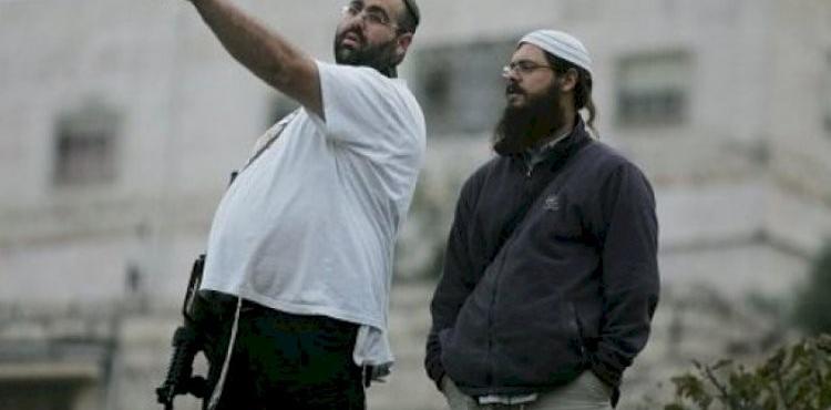 مستوطن يطلق النار.jpg