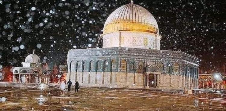 الثلوج تتساقط في القدس.jpg