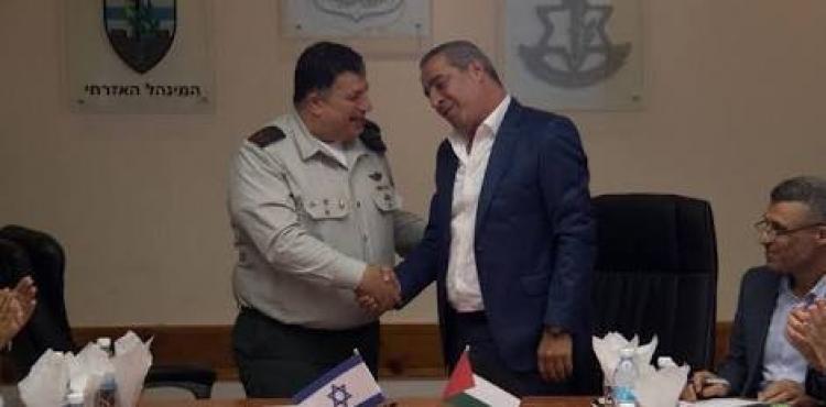 حسين الشيخ والمنسق.jpeg