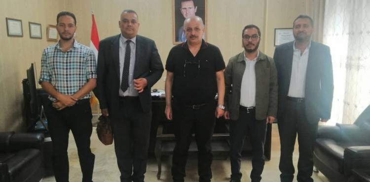 وفد فلسطيني يزور مستشفى الباسل.jfif