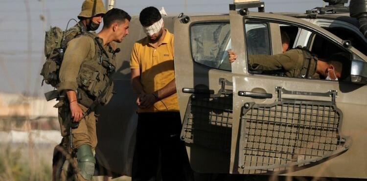 اعتقال - السياج الفاصل.jpeg