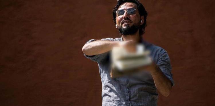 المسيء للمصحف الشريف.jpg