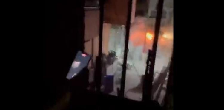 تفجير عبوة ناسفة في جرافة إسرئيلية بالضفة.JPG