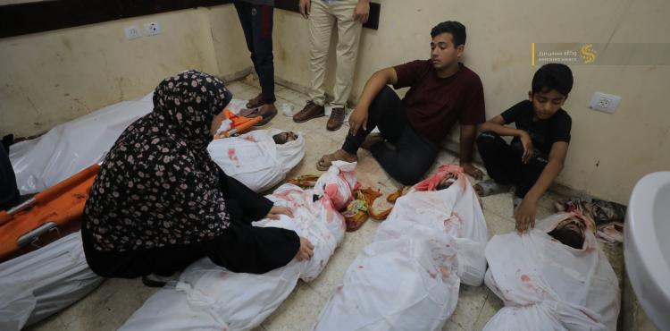 أهالي الشهداء يودعون أبنائهم في مستشفى العودة بالنصيرات وسط قطاع غزة 7.jfif