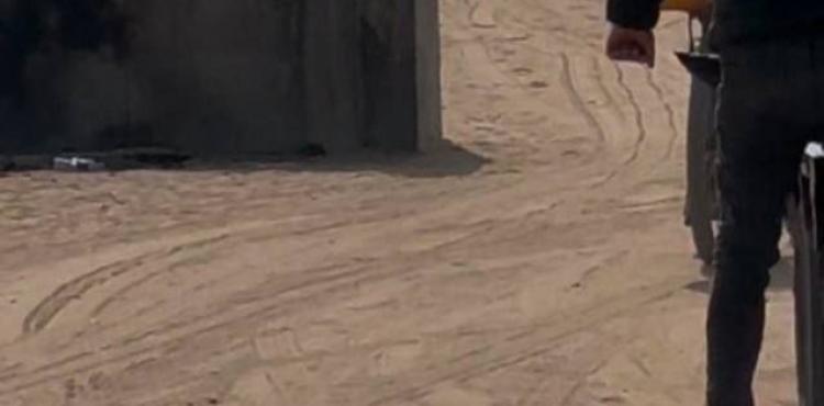 قصف سيارة على شارع الرشيد.jpg