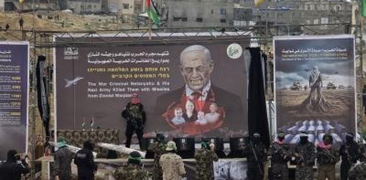 صفقة تبادل عائلة بيباس في توابيت قتلى  (1).jpg