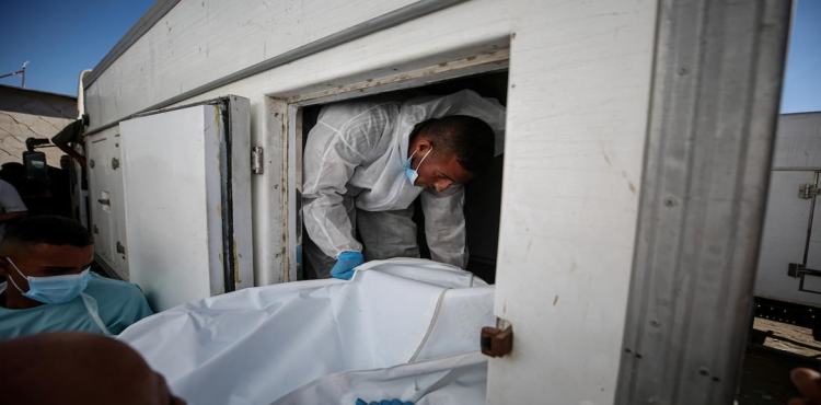 تسليم جثامين الشهداء.jpg.png