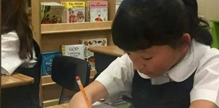 فتاة بدون يدين تفوز بمسابقة خط