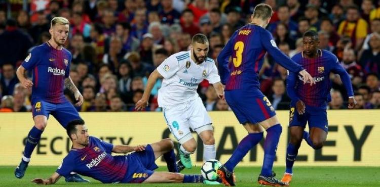 لاعبو ريال مدريد وبرشلونة