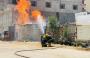 إطفاء حريق في اسطوانات غاز بغزة.jpg