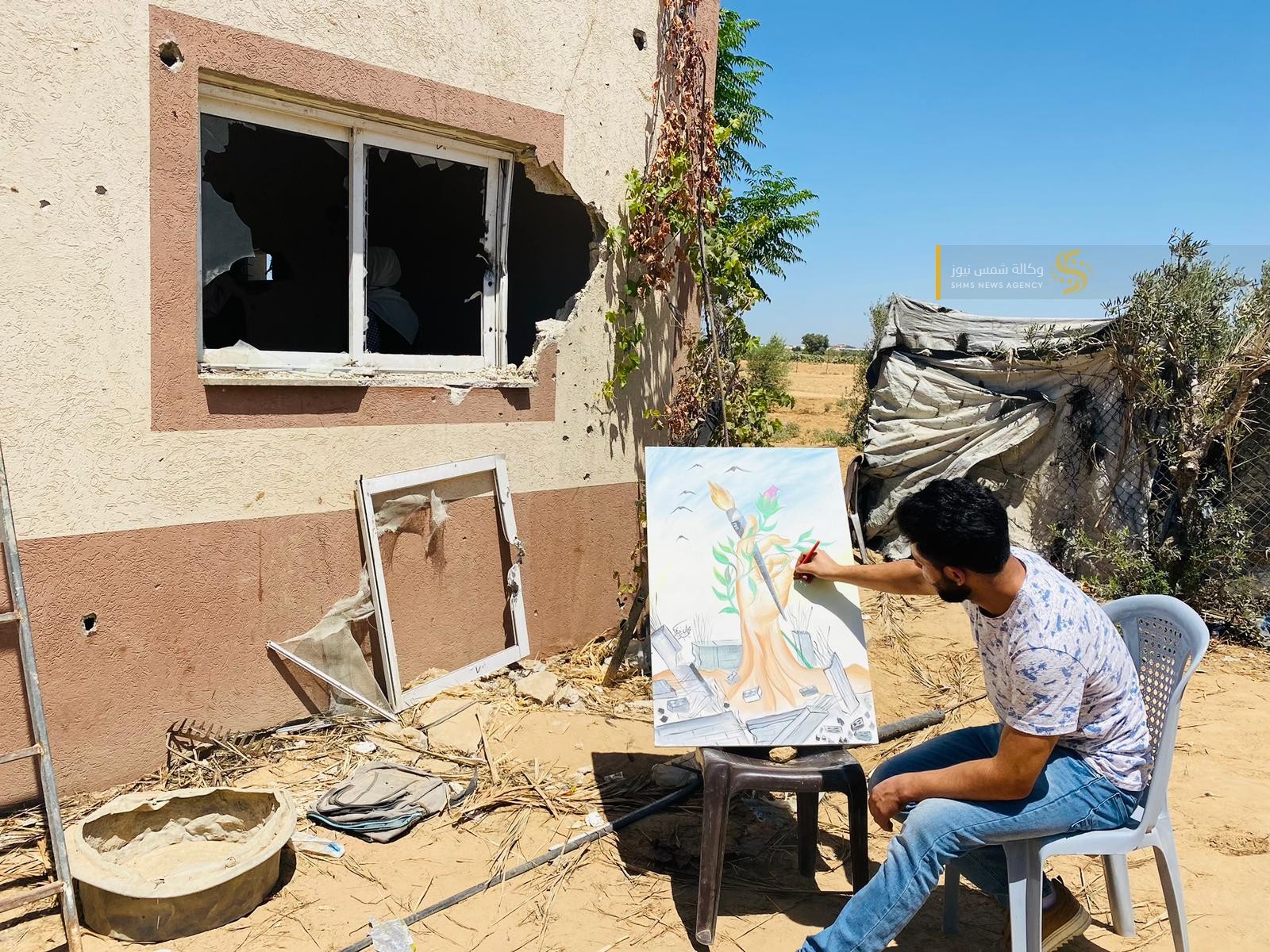 فنانون تشكيليون يوثقون حجم الجريمة الإسرائيلية في خانيونس.jfif